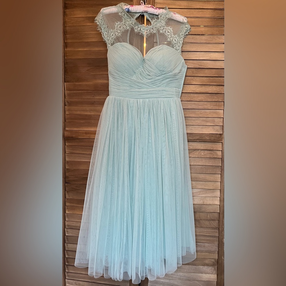 Elegant Blue lace dress. Womens size small.